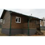 Облицовка фасада домов планкеном из древесины сибирской лиственницы 2000х90х20мм. с покрытием восковой лазурью цвет ‘орех’