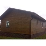 Облицовка фасада домов планкеном из древесины сибирской лиственницы 2000х90х20мм. с покрытием восковой лазурью цвет ‘орех’